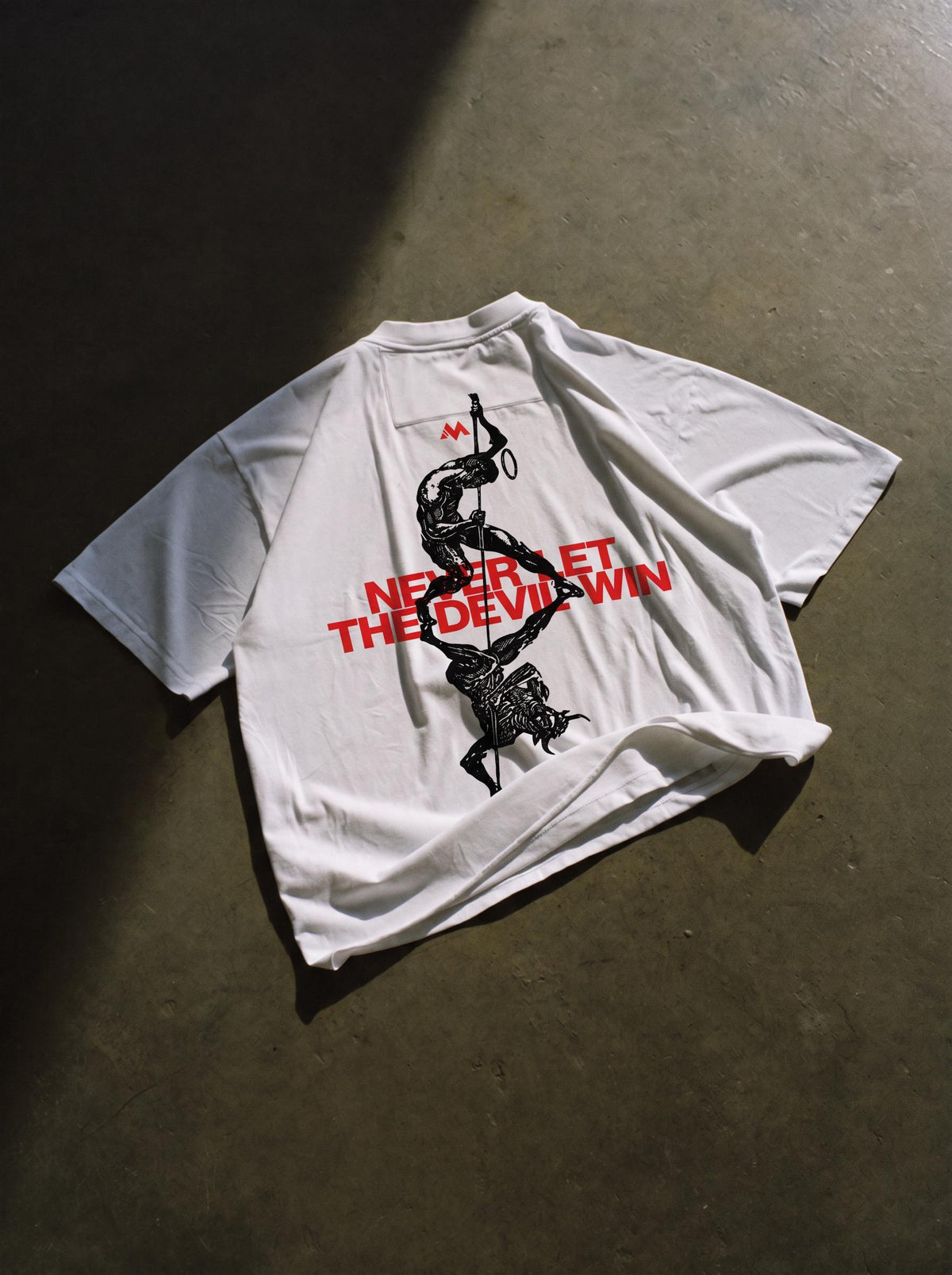 NEVER LET THE DEVIL WIN TEE