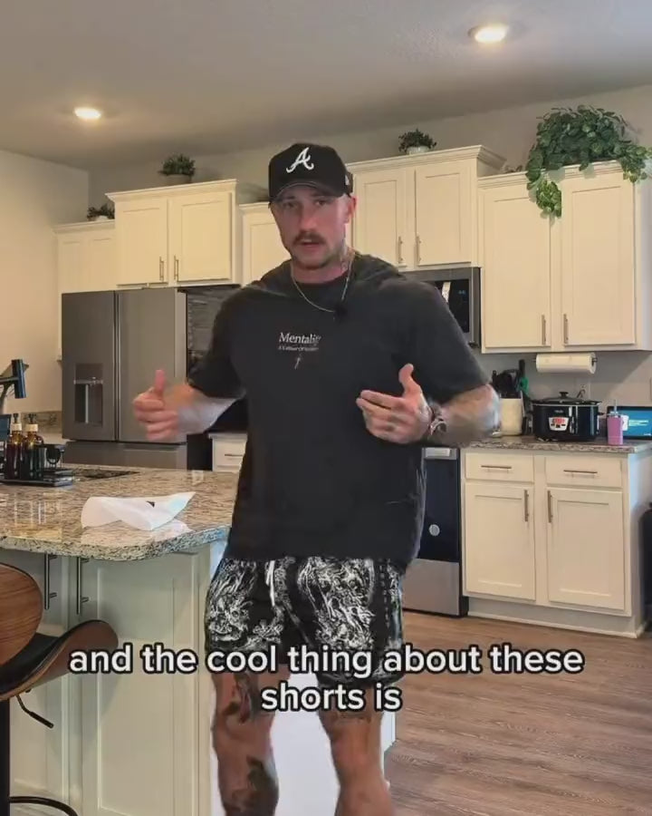 Mentality reversible shorts being turned inside out, showing both sides